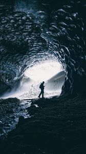 Preview wallpaper cave, man, silhouette, alone, dark