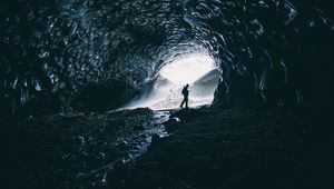 Preview wallpaper cave, man, silhouette, alone, dark