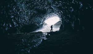 Preview wallpaper cave, man, silhouette, alone, dark