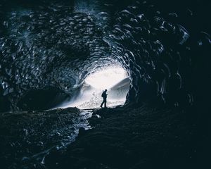 Preview wallpaper cave, man, silhouette, alone, dark