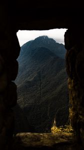 Preview wallpaper cave, mountain, forest, peak, mountain range