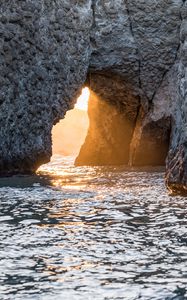 Preview wallpaper cave, rock, sunlight, water, sea