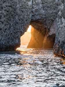 Preview wallpaper cave, rock, sunlight, water, sea