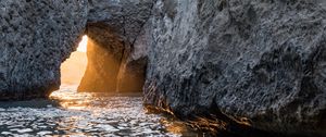 Preview wallpaper cave, rock, sunlight, water, sea