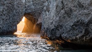 Preview wallpaper cave, rock, sunlight, water, sea