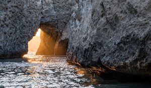 Preview wallpaper cave, rock, sunlight, water, sea