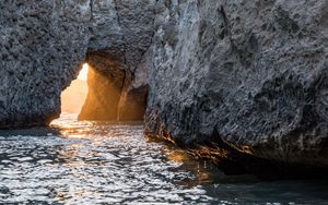 Preview wallpaper cave, rock, sunlight, water, sea