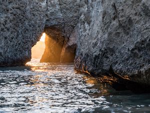 Preview wallpaper cave, rock, sunlight, water, sea