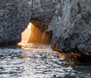 Preview wallpaper cave, rock, sunlight, water, sea