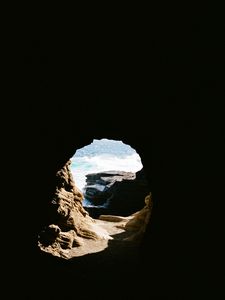 Preview wallpaper cave, rock, water, waves, dark