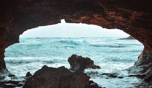 Preview wallpaper cave, rock, waves, sea
