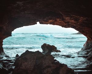 Preview wallpaper cave, rock, waves, sea