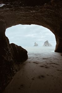 Preview wallpaper cave, rocks, beach, sea