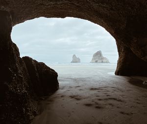 Preview wallpaper cave, rocks, beach, sea