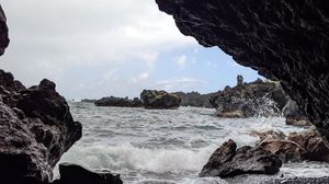 Preview wallpaper cave, rocks, sea, pebbles