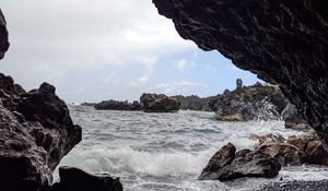 Preview wallpaper cave, rocks, sea, pebbles