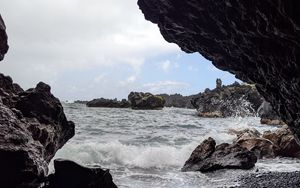 Preview wallpaper cave, rocks, sea, pebbles