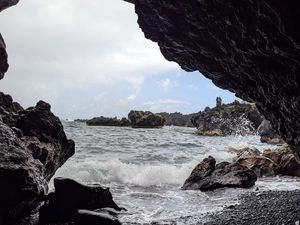 Preview wallpaper cave, rocks, sea, pebbles