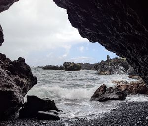 Preview wallpaper cave, rocks, sea, pebbles