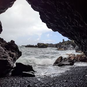 Preview wallpaper cave, rocks, sea, pebbles