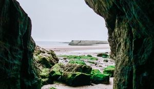 Preview wallpaper cave, rocks, stones, beach