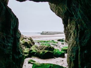 Preview wallpaper cave, rocks, stones, beach