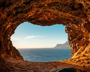Preview wallpaper cave, rocks, stones, sea, horizon