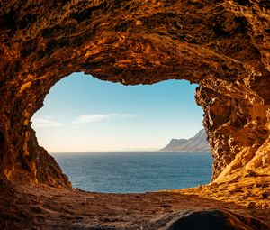 Preview wallpaper cave, rocks, stones, sea, horizon