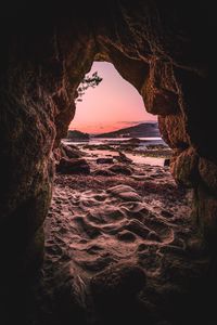 Preview wallpaper cave, sand, stones, sea, nature