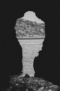 Preview wallpaper cave, sea, hill, black and white