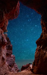 Preview wallpaper cave, starry sky, stars, rocks, desert