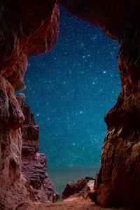 Preview wallpaper cave, starry sky, stars, rocks, desert