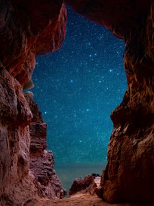 Preview wallpaper cave, starry sky, stars, rocks, desert