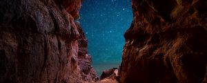 Preview wallpaper cave, starry sky, stars, rocks, desert