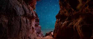 Preview wallpaper cave, starry sky, stars, rocks, desert