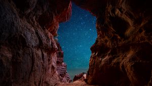 Preview wallpaper cave, starry sky, stars, rocks, desert
