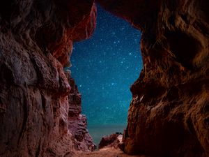 Preview wallpaper cave, starry sky, stars, rocks, desert