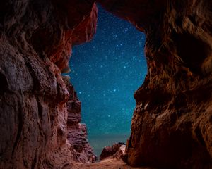 Preview wallpaper cave, starry sky, stars, rocks, desert