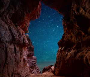 Preview wallpaper cave, starry sky, stars, rocks, desert