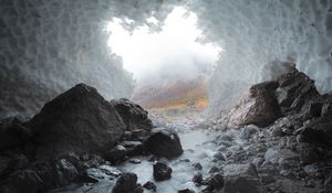 Preview wallpaper cave, stones, ice, stream, frozen