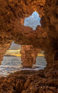 Preview wallpaper cave, stones, sea, rocks