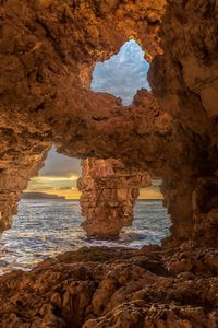 Preview wallpaper cave, stones, sea, rocks