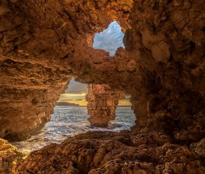 Preview wallpaper cave, stones, sea, rocks