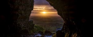 Preview wallpaper cave, sun, sunset, landscape, nature