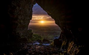 Preview wallpaper cave, sun, sunset, landscape, nature