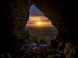 Preview wallpaper cave, sun, sunset, landscape, nature