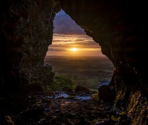 Preview wallpaper cave, sun, sunset, landscape, nature