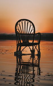 Preview wallpaper chair, sea, sunset, reflection, water