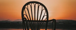 Preview wallpaper chair, sea, sunset, reflection, water