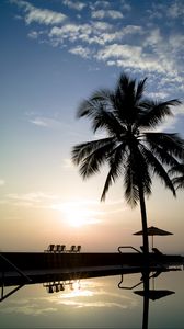 Preview wallpaper chairs, swimming pool, palm trees, silhouettes, dark